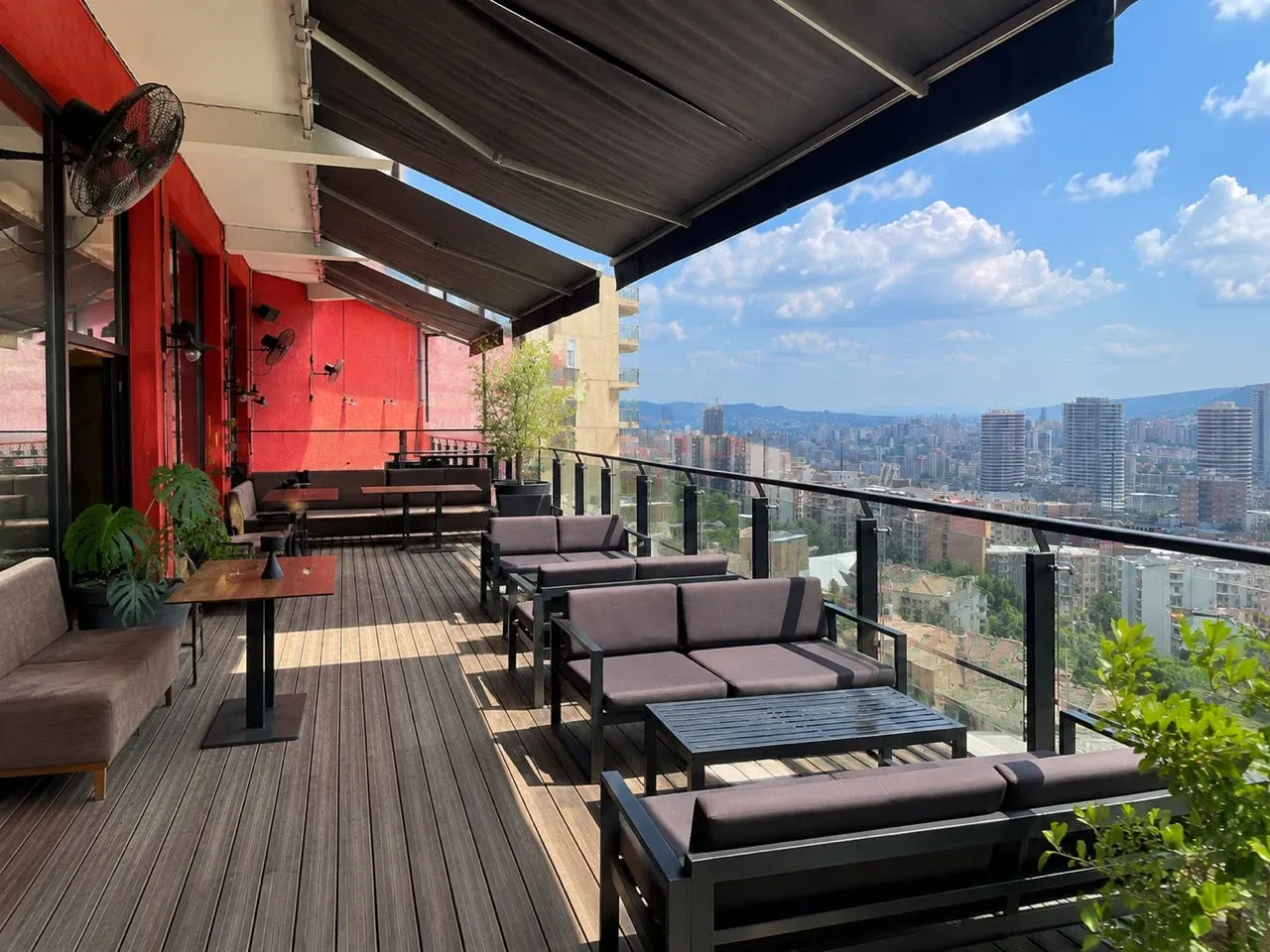Social Tbilisi veranda seating overlooking the Tbilisi skyline